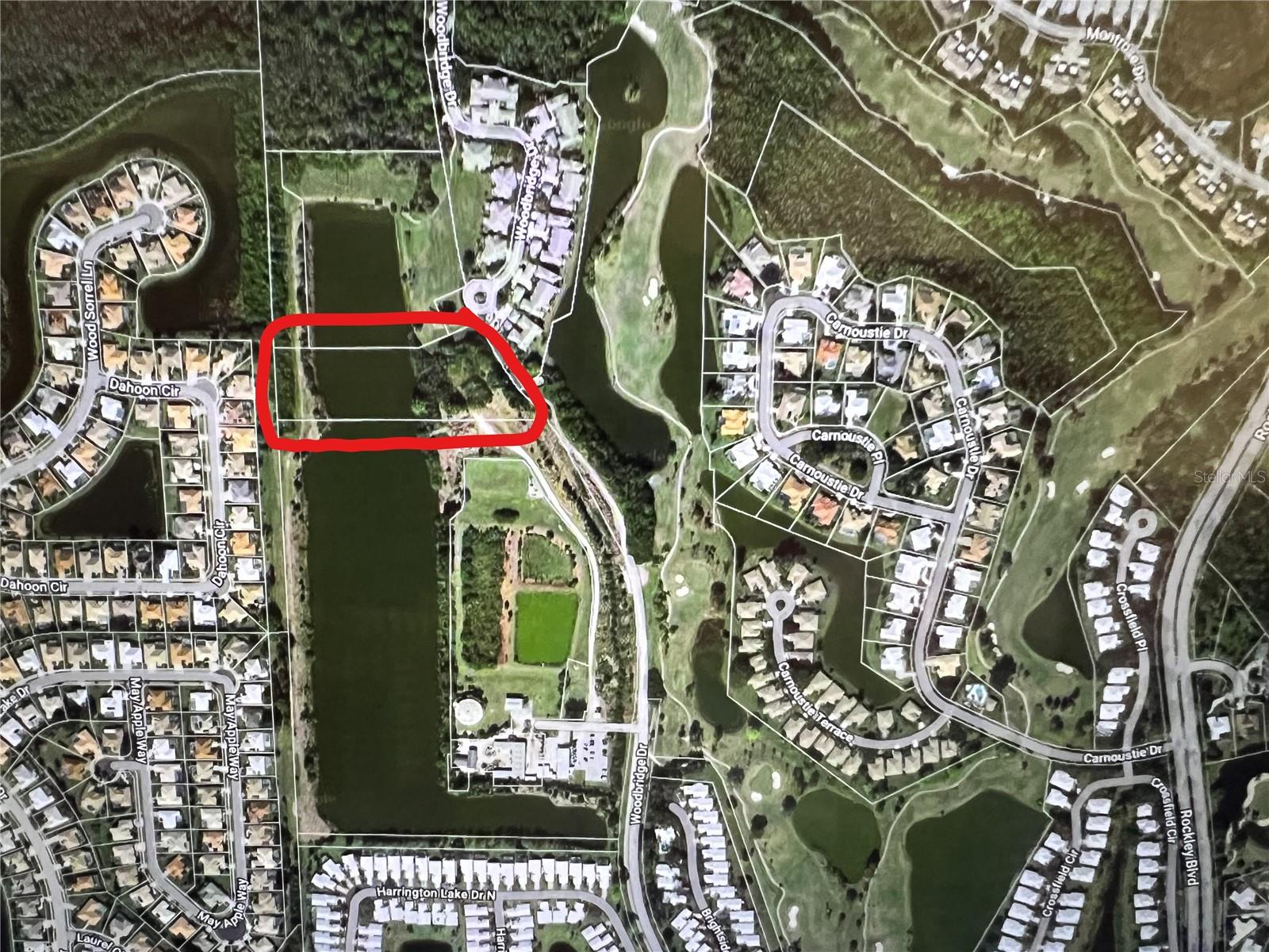PRICE IMPROVEMENT!!! Welcome to this unique and unusual vacant lot within a golf community but not part of the HOA. Please check with county for permitted uses. Enjoy the serene and private setting as the property is at the end of a Cul-de-Sac.  The property offers the freedom and flexibility to design your home that truly suits your lifestyle and needs.  The retention pond that encompasses about half of the property provides a natural and beautiful feature of the property.  With easy access to shopping, dining and entertainment options, this lot is the perfect location for those seeking a balance between relaxation and convenience.  Take a drive by at your convenience. Note the Seller requires their custom contract and terms.  Call for details.