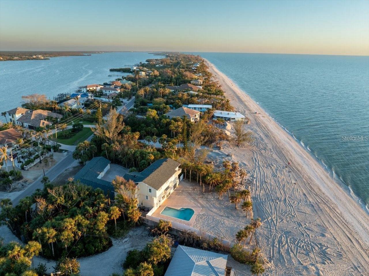 Experience the pinnacle of coastal luxury at this extraordinary 5-bedroom, 4.5-bath beachfront estate offering approximately 5,223 square feet of refined living space and over 100 feet of pristine sandy shoreline with sweeping, unobstructed views of the Gulf of Mexico.
This rare offering includes deeded beach-to-bay access with a private boat slip directly across the street, providing seamless navigation from the Gulf to Lemon Bay—an exceptional feature for boating enthusiasts. The property delivers the perfect balance of peaceful beachfront living with convenient access to world-class dining, shopping, and cultural attractions.
Designed for both luxury and versatility, the home features two full kitchens, one equipped with a premium Viking appliance package, expansive counter space, and thoughtful layouts—ideal for entertaining, hosting extended family, or multi-generational living. Three finished living levels provide generous accommodations and flexible living spaces for guests and family alike.
Adding to its exceptional value, the home offers a base flood elevation of approximately 11 feet and did not experience flooding during recent hurricanes, providing added peace of mind for coastal ownership. Recent improvements also include a newer roof, enhancing long-term durability and value.
Outdoors, enjoy a private tropical oasis highlighted by a large in-ground pool surrounded by lush landscaping, creating an inviting setting for relaxation or entertaining. An impressive 8-car garage offers abundant room for vehicles, watercraft, beach equipment, and storage.
From morning walks along miles of unspoiled shoreline to evenings watching spectacular sunsets over the Gulf, this exceptional property offers far more than a home—it offers a lifestyle defined by privacy, tranquility, and natural beauty.
Schedule your private showing today to experience the unmatched beauty of beachfront living.
Buyer to verify all room sizes lot size and square footage, which are approximate.