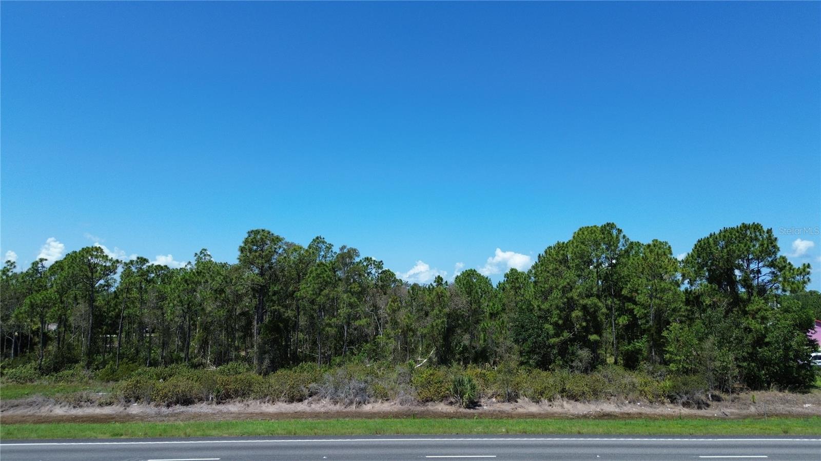 200 feet of frontage of a prime commercial opportunity on the highly traveled Tamiami Trail (US-41) APPROXIMATLEY 30,000 VEHICLES A DAY. This offering includes four contiguous parcels, 12215, 12209, 12219, and 12225 Tamiami Trail, with excellent visibility.  Ease of access for the Northbound traffic with an extra-wide road crossing/turnaround. Conveniently situated just 1 mile from Interstate 75, this property offers outstanding exposure for a variety of commercial uses, including but not limited to Animal Hospital, Assisted Living, Day Care, Gas Station, Hotel, Medical Office, Paid Parking Lot, Clubs, Restaurant, and much more!.  Make this your next business opportunity or investment.  This is a rare opportunity to acquire multiple parcels with high-traffic frontage in a strategic location.