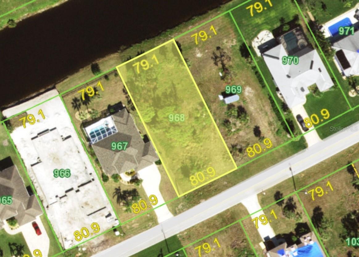OVERSIZED 1/3 ACRE WATERFRONT lot with a northwest facing backyard to take advantage of those gorgeous sunset views. If you have been looking for the perfect spot to build your paradise Florida dream home, this is it! Rotonda West is a beautiful deed restricted community with low HOA fees (only $190 a year) that offers a community park with tennis / pickleball courts and also a community center with a doggie friendly walking path. Many new custom homes being built in the immediate area. There are 5 public easy play golf courses within the community of Rotonda for those who golf, the trailhead for the Pioneer Bike Trail is just 1 mile up the road for the bicyclist. Take your pick of the beautiful Gulf beaches on Manasota Key or Boca Grande Island that are just minutes away. A perfect peaceful location in paradise for your Florida dream home!