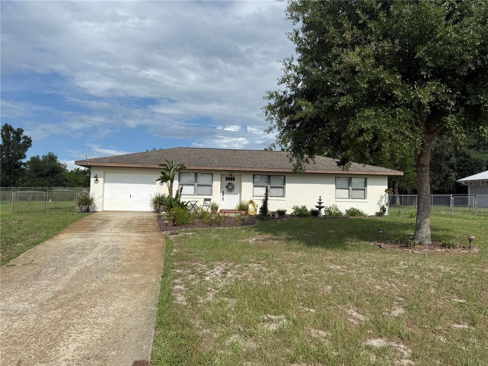 Great location in Sylvan Shores subdivision. This updated home is ready for new owners. Newer Mohawk flooring, granite
kitchen with stainless steel appliances, farmhouse sink and induction range with convection and air fryer functions. The
kitchen is open to the dining and living areas with a large island for hosting. There is also a pass through to the screened
back porch with granite ledge. Shed installed in 2022 with two lofts and 16 foot 3 tier shelving along the back wall, 2.5 ton
a/c system installed in 2021, water heater replaced in 2021, new washer and dryer December of 2025. The shed is great
for storage or man cave with electric. There is also a small deck where an above ground pool can be placed or turn it into
your own vision. Fenced backyard with plenty of space, drive through gates on both sides. Conveniently located just
2 miles from town, grocery stores, doctors, restaurants and more. There is also a public boat ramp on Lake Clay just a
few blocks away (less than a mile). Owners are licensed Florida Real Estate Agents.