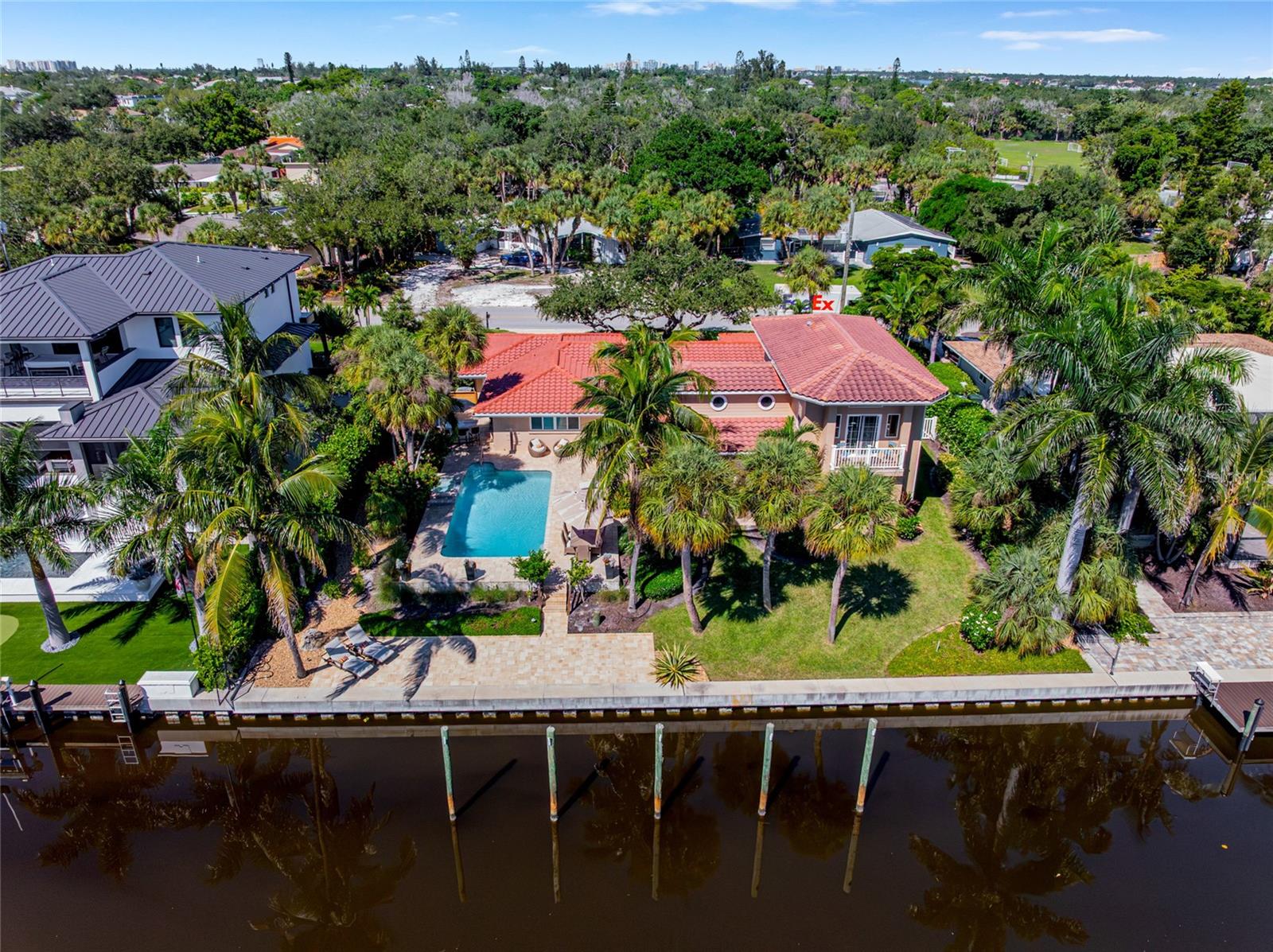 Some homes on Siesta Key are about the beach. Others are about boating. This one lets you have both.
Set along a protected canal with direct boating access to Sarasota Bay through the Grand Canal, and from there to the Intracoastal Waterway and the Gulf, this Siesta Key waterfront home is made for the way life is meant to be lived.
Take the boat out for the morning, launch a kayak or paddleboard from your own waterfront, spend some time at Siesta Key Beach, then come home to your private saltwater pool, outdoor kitchen and quiet canal view.
The important updates are already here too: a 2021 reroof, impact windows and sliders installed in 2022, plus new first floor flooring, fresh interior paint, a luxury renovation of the first floor primary bath, an outdoor kitchen and waterfront pavers, all completed in 2026. Plantation shutters finish every window and slider.
At the center of the home, a fully screened courtyard lanai with a tabletop fire pit extends the living space. Seven impact sliders connect several rooms directly to the courtyard, filling the home with natural light and creating an easy indoor outdoor flow toward the pool and waterfront. Additional sliders from the flex room open toward the pool. The home and pool sustained no storm damage during the 2024 storms.
If you haven’t dropped anchor yet, wait until you see the two amazing primary suites.
The first floor primary offers courtyard access, two walk in closets and a beautifully renovated 2026 ensuite bath with upscale finishes. Upstairs, the entire second level becomes a private retreat with canal views, a spacious bath, two more walk in closets and its own waterfront balcony. One closet is so large you may wonder if it could qualify as a New York City apartment. When it is time for a little quiet, open the sliders and take in sunset over the canal, or start your morning with fresh air and coffee on the balcony.
A redesigned media and flex area now includes an additional bedroom while preserving an approximately 424 square foot flex room for a media room, gym, game room or lounge. Another bedroom includes a Murphy bed and built in desk, making it an easy guest room, home office or both.
Outside is where this home really earns its Siesta Key address. The private saltwater pool is surrounded by tropical landscaping and spaces for relaxing, dining and entertaining. The seawall, bulkhead and davits were replaced in 2021, with the waterfront setup planned around a 45 foot Sea Ray. This is a home for boaters who want to use the water, not simply look at it.
Set in the heart of Siesta Key, the home is just minutes from Siesta Key Beach, named the No. 1 in the U.S. for 2026 and recognized among the nation’s best many times over. Known for its powdery quartz sand and Gulf waters, it is one of the reasons living here is so special. Siesta Key Village is close by for restaurants, bars, live music and boutiques. Sarasota is just beyond the North Bridge, with downtown waterfront dining, shopping, galleries, theaters, performing arts and cultural attractions close at hand.
Whether you are looking for a full time Siesta Key waterfront home or a second home for family and friends, 5376 Shadow Lawn Drive offers true boating access, a private saltwater pool, substantial updates, flexible living space and an exceptional island location.
This is the kind of home where every day can include the beach, the boat and dinner by the pool. That is a pretty wonderful way to live.
