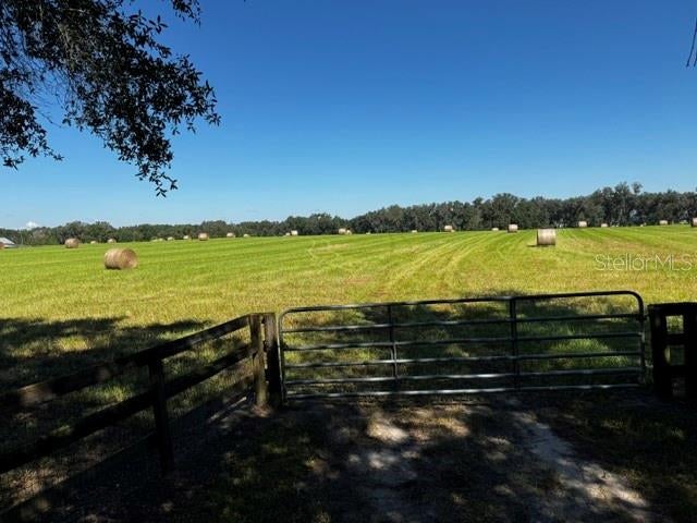 Open spaces, 40 ACRES , Just enough Beautiful Trees, High & Dry, Quiet Paved road,  Located in the NW and an easy drive to WEC... Want more? Producing hay field with well maintained ground and soil, lush grasses!  With larger parcels being harder to find this is an amazing opportunity. This land is ready to be your Dream Farm! Property is in 2 20 acres parcels being sold together, it is fenced and gated. Zoned Agricultural.