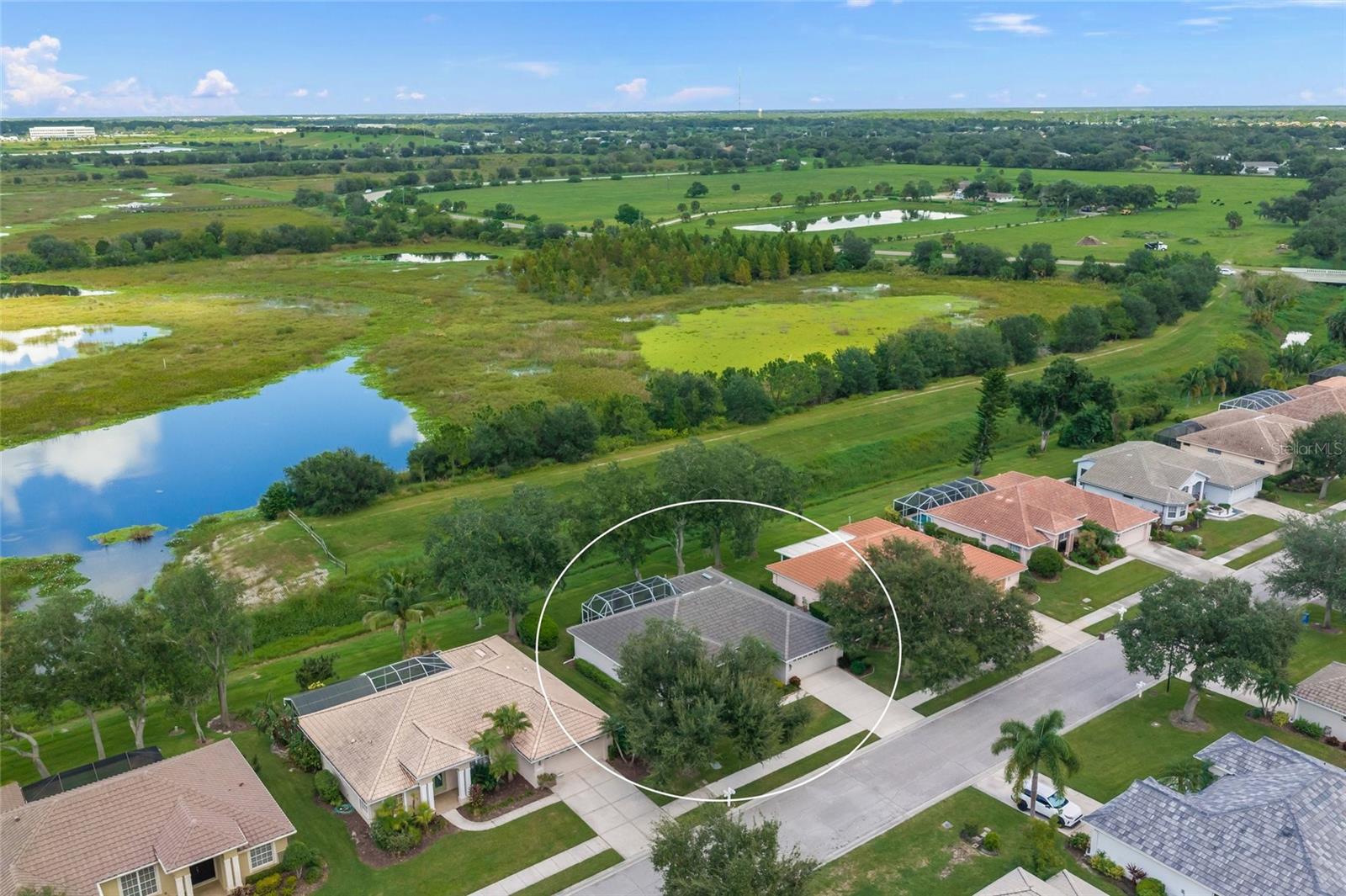 This is the one * PANORAMIC VIEWS OF THE COUNTY PARK, CELERY FIELDS & AUDUBON BIRD SANCTUARY * YOU WILL NOT FIND A BETTER VIEW! * THESE ARE MUST SEE VIEWS with INCREDIBLE SUNSETS ! * UPGRADED PREMIUM LOCATION * VERY PRIVATE SETTING * A' RATED SCHOOL DISTRICT * NEW BARREL TILE ROOF IN 2023 * Relax on your 29X22 Screened Lanai * Immaculate 3 Bedrooms & 2 Bath split plan home * 3rd Bedroom is used as a Den (no closet) * Vaulted ceilings * Open LARGE Eat-in Chef's Kitchen with corian counter-tops & solid wood cabinets * Kitchen has easy access to Great Room & Lanai * Primary Suite has a Spa-like Bathroom with dual sinks & walk-in shower * 2 Car Garage * Spacious Lanai is perfect for entertaining or just relaxing in your private slice of paradise * LOW HOA fees include entire irrigation system, landscaping - mowing all grass, spraying for weeds, fertilizing grass, trimming hedges below 10', basic Comcast tv; park, common areas, entrance & neighborhood lighting * Enjoy the lifestyle you deserve * Walk or bike to the renowned Celery Fields, a birding hotspot * Country feel yet only 15 minutes to World Famous Siesta Key Beach, dining, shopping, Doctors Hospital, UTC Mall & all the wonderful amenities Sarasota has to offer. RUN, DON'T WALK TO SARASOTA'S BEST KEPT SECRET IN SOUGHT AFTER DEERFIELD * ENJOY THE MAINTENANCE-FREE LIFESTYLE WITH VERY LOW HOA FEES & NO CDD * One look & you'll fall in LOVE