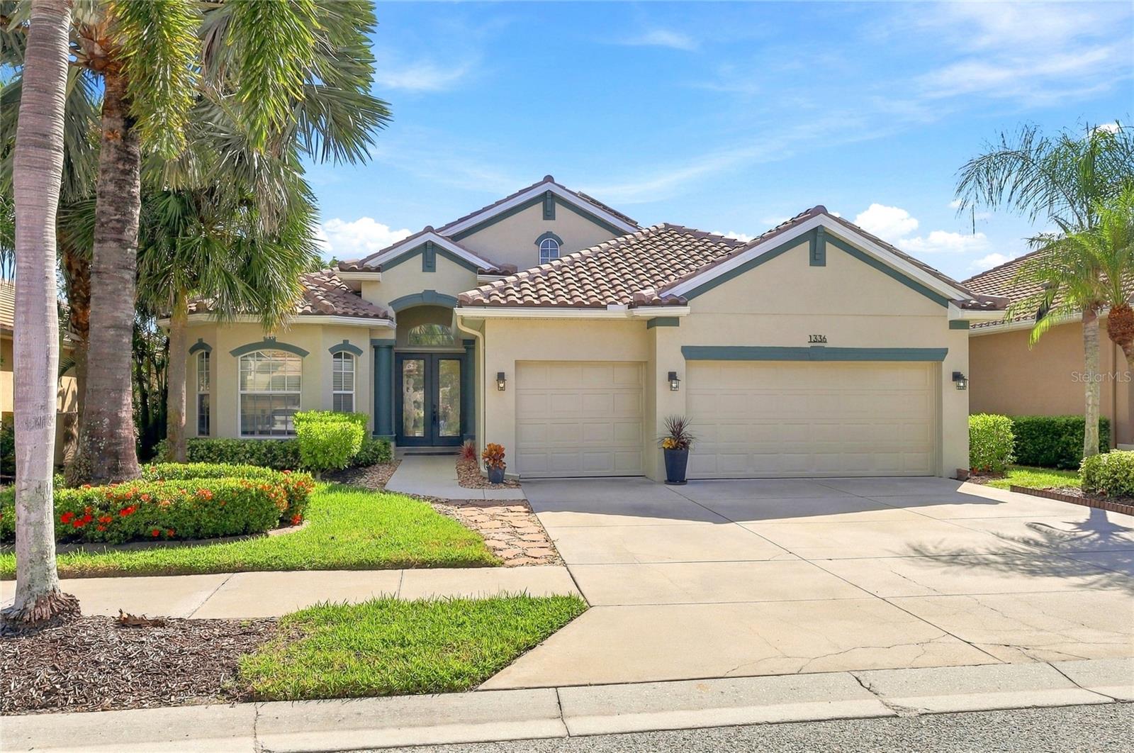 Welcome to the luxury living lifestyle in the desirable gated golf course community of Heron Creek Golf and Country Club! Enjoy this wonderful 3 bedroom, 3 1/2 bath with office/ den/ study and 3 car garage  with over 2500 sq ft of living space. As you approach the home you will notice the beautiful etched glass double entry doors. Upon entering the home you will feel the expansiveness of the open floor plan featuring the great room with soaring  tray ceilings  adorned with crown molding and accent columns. The view from the great room is amazing, looking out through the triple sliders to the huge lanai, sparkling, solar heated pool and serene lake. The formal light a bright formal dining room is the perfect place to indulge in a delicious meal with family and friends. The kitchen  is truly a chef’s delight  offering Stainless Steel appliances including gas cooking, lots of solid wood cabinetry, solid surface counters with breakfast bar and island, RO system, new, attractive pendulum lighting and dry bar with pass through to the dining room. The breakfast area just off the kitchen over looks the lanai/ pool area and lake. This is the perfect place to start your day! The generous size owner’s retreat is complete with ensuite bath, dual sinks, soaking tub, walk in shower  and 2 walk-in closets and well as an additional half bath that doubles as a pool bath. This is a true split floor plan with the guest bedrooms located on the other side of the house from the owner’s retreat providing the utmost in privacy for you and your guests. These two generous size bedrooms share a bath with shower/ tub combination and vanity with solid wood cabinetry.  The office/ den/ study is located in the front of the home making it a nice getaway. Adjacent to the office/ den/ study is another full bath with shower/ tub combination and vanity with solid wood cabinetry. The outdoor space in the home is magical offering a wonderful place to bring the entertainment out doors or simply for your own relaxation. Take a dip in the heated pool, sip on your favorite beverage and take in the views of the lake. There are MANY extras in this fabulous home including, New roof, freshly painted inside and out, fully paid for solar, Newer refrigerator, decorative accent columns, tile throughout the main living area, plantation shutters and some hurricane shutters.  Heron Creek Golf and Country Club is an active community where there is something for everyone. 27 Holes Arthur Hills designed golf course, recently remodeled Fitness center, 5 HAR Tru tennis courts, resort pool and spa, Courtside Cafe where you can grab a bite after your workout, swim, tennis match or making the turn to the next nine. There is also a 21,000 sq ft Clubhouse offering fine and casual dining and many planned social activities. Heron Creek is in a great location near area beaches, shopping, restaurants, Legacy Trail, Cool Today Park. There is also a new Sarasota Memorial Hospital being built on Sumter Blvd. slated to open in 2028. Start living the Florida Lifestyle you have been wanting. Let’s make this home yours today!