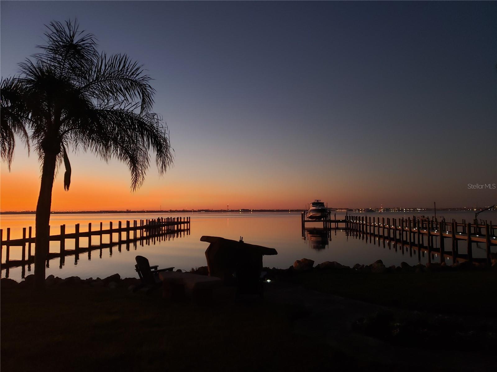 Enjoy the most MAGICAL SUNRISES & SUNSETS from your backyard on the BEST LOT ON CHARLOTTE HARBOR, NOW AVAILABLE. It is truly a
fishing and boater's paradise with AMAZING VIEWS AND LOCATION! Owners' plans changed so do not miss out on this nearly 1-acre site, with an
extra deep lot, full privacy fencing along the Western border, established vegetation, and mature trees for privacy. 
 Full floor plans and recent surveys available upon request. Dock and pilings in
place with deep water (formerly had a 42' boat at end) on site. Nearby to all things Port Charlotte and Punta Gorda, Sunseeker, great hospitals,
shopping, and more, including I-75, & the PGD airport. Check it out today!