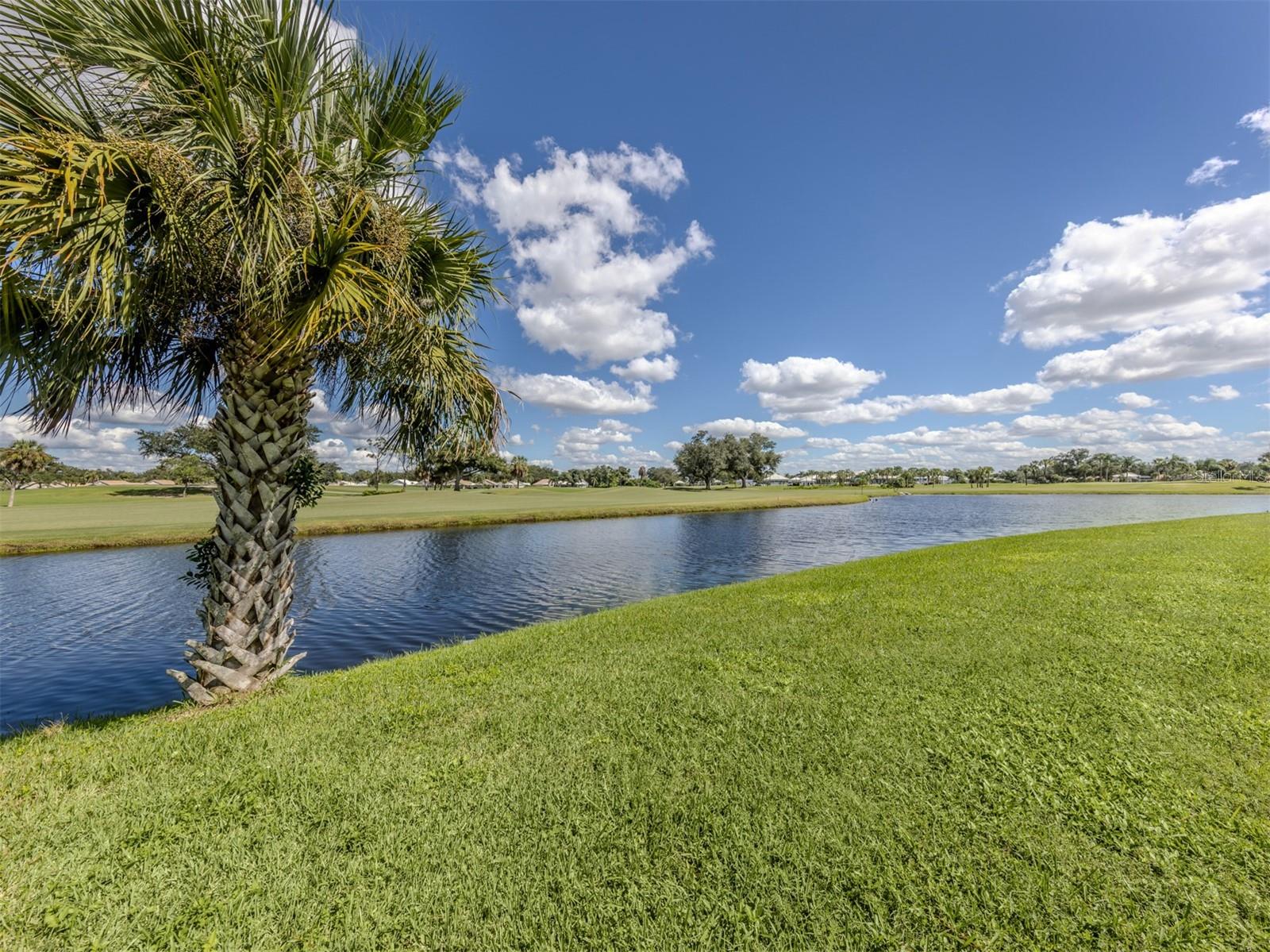 GORGEOUS WATER AND GOLF COURSE VIEWS! Enjoy the relaxing Florida lifestyle in the beautifully updated second floor condo (with elevator)in the desirable Plantation Golf and Country Club community.  The breathtaking water and golf course views create a peaceful backdrop for everyday living, best enjoyed from your private lanai, where all furniture stays! Open the windows and let the wonderful Florida breezes flow through your home.  The updated kitchen features soft close drawers and stainless steel appliances. Both bathrooms have been beautifully renovated. the guest bath is especially sharp, with stylish updates that make it perfect. The primary suite offers a spacious walk in closet, convenient bedroom laundry with stackable washer and dryer.  The updated bath features double sinks, soft close drawers, new tile, updated flooring and a walk in shower.  A sliding glass door in the master bedroom provides additional access to the lanai and provides a fabulous evening breeze.Easy sleeping and a cut in A/C costs. Marble sills in bedrooms, a newer hot water heater, Pergo flooring, which shows no dirt or scratches, this terrific flooring is throughout, ceiling fans in most rooms add comfort and appeal.  An elevator provides easy access to this second-floor residence. With its beautiful updates, desirable furnishings, stunning views and a community with strong financials, this is a wonderful opportunity to enjoy the best of Florida living.  Sit back, relax, and take in the scenery. this is the kind of place that makes you feel right at home, comfy and cozy and happy.