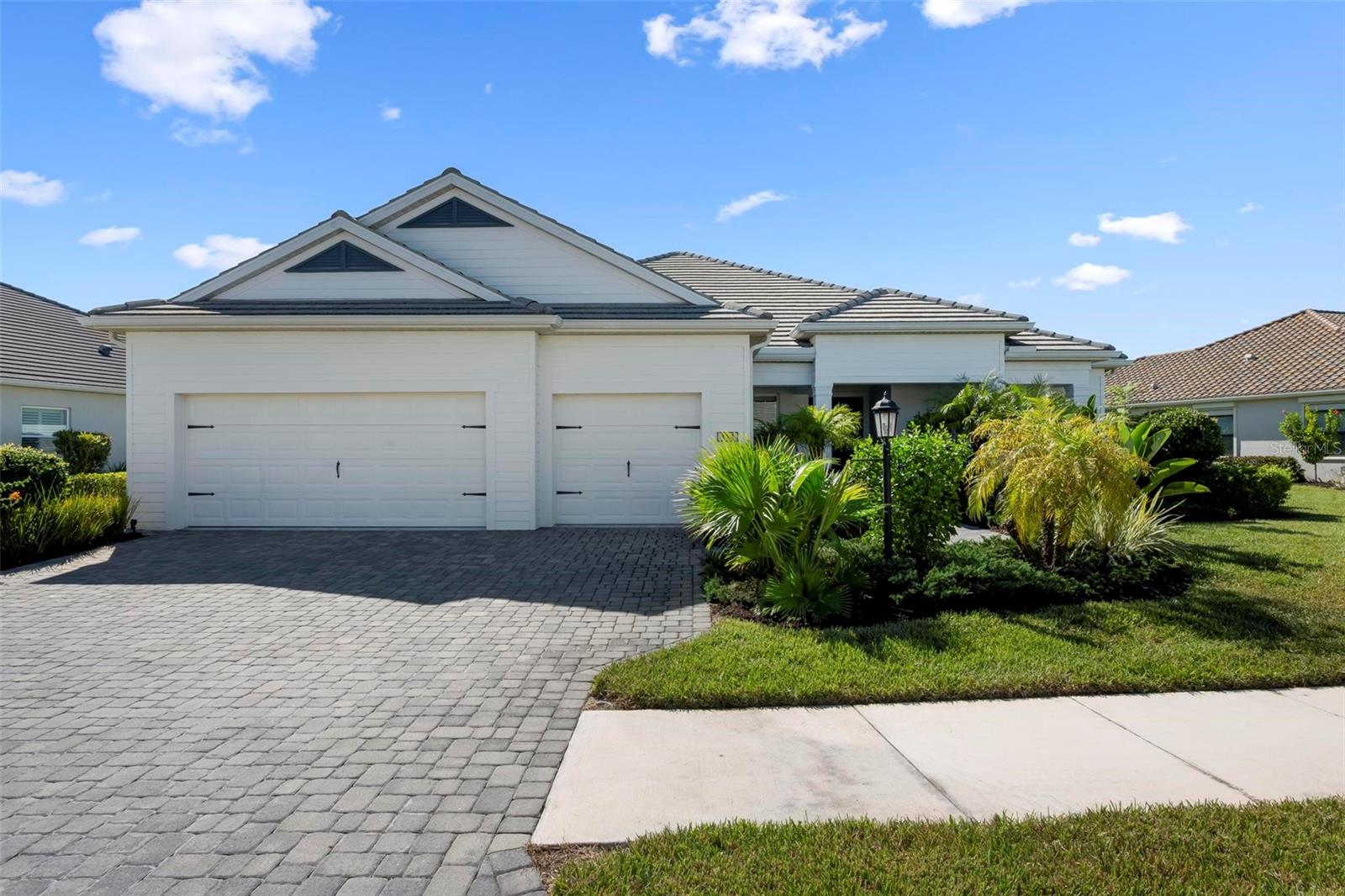 Looking for Picturesque Pond Views & Exceptional Entertaining Spaces...

Discover this exceptional 3-bedroom, 3-bath Captiva model, ideally situated along a picturesque pond on a quiet cul-de-sac. Offered fully furnished with a few exceptions, this home is ready for you to move in and enjoy!

The screened lanai features an outdoor kitchen perfect for entertaining while enjoying the peaceful water views. Inside, high ceilings, plantation shutters, and a shiplap-accented foyer add style & character. The kitchen offers granite counters, soft close cabinetry, walk-in pantry with custom shelving & lighting, while a dedicated study and impressive club room with custom bar, refrigerator, and pool table provide versatile spaces for work and play.

Additional features include remote-controlled storm shades at the rear of the home, a three-car garage with workbench and utility sink, & laundry room with extra storage. Too many upgrades to mention.

Enjoy country club living in a Boca Royale with golf and racquet sports available but not required, giving you the flexibility to embrace the lifestyle on your terms. This exceptional home offers the perfect blend of comfort, convenience, and the Florida Lifestyle!