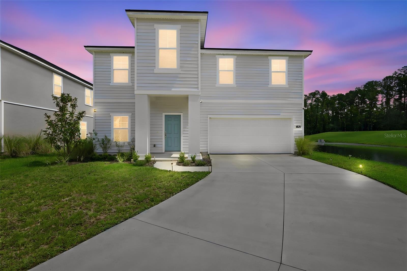 WELCOME TO A UNIQUE PROPERTY IN DUNNS CROSSING! Spectacular residence built in 2025, offering approximately 3,533 Sq Ft, 5 bedrooms, 3 bathrooms, a versatile loft, and a dedicated theater room, situated on a premium 0.68-acre corner lot with lake views—a combination that is difficult to find in Jacksonville 32218.

The open-concept design features a modern kitchen with 42-inch cabinets, quartz countertops, a large island, and pantry, complemented by LVT flooring throughout the main living areas. The spacious primary suite offers a generous walk-in closet and a well-appointed bathroom. One of the bedrooms is conveniently located on the first floor and features a full bathroom, making it ideal for guests, family members, or a private home office. The additional bedrooms provide flexibility for the entire family.

Enjoy the Florida lifestyle from the spacious open rear patio overlooking the backyard, perfect for relaxing or entertaining.

Located on a cul-de-sac and corner lot, this property offers an exceptional combination of space, land, privacy, and lake views. The solar panel system is currently leased, with the possibility of transfer or removal in accordance with the terms of the contract.

Dunns Crossing offers a community playground and pond, with convenient access to River City Marketplace, shopping, restaurants, parks, I-95, I-295, and Jacksonville International Airport.

A rare opportunity to own a recently built home with the space, land, versatility, privacy, and lake views that simply aren’t found every day.