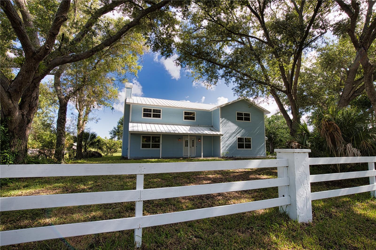A Rare Fly-In Opportunity with Private Hangar & Direct Airfield Access
Calling all pilots and aviation enthusiasts! This unique Englewood property combines a spacious Florida home with something exceptionally difficult to find: your own detached airplane hangar with direct access to Buchan Airfield (X36).
Situated on approximately 0.88 acres, the home offers 4 bedrooms, 2.5 baths, approximately 2,850 square feet of living area, and an attached 2-car garage. The property provides plenty of room for family, guests, a home office, or hobbies, while the generous homesite offers the space and privacy that are becoming increasingly hard to find in coastal Southwest Florida. This rarely available property is appointed with a metal roof, impact insulated windows, fireplace, and updates including Hardie Plank siding and roof-deck foam insulation.
What truly sets 916 Bayshore Drive apart is the detached airplane hangar and direct access to Buchan Airport. Buchan is a public-use general aviation airfield in Englewood (FAA identifier X36) featuring a turf runway. For a private pilot, aircraft owner, collector, or aviation enthusiast, the ability to keep your aircraft at home and access the airfield directly creates a lifestyle few residential properties can provide.  Imagine walking out your door, opening your own hangar, pulling out your aircraft and heading directly to the runway—no drive to the airport and no separate hangar rental. When you're not flying, you still have the convenience of a substantial 4-bedroom home, 2-car garage and nearly an acre of land in Englewood.
This isn't simply a home with a large outbuilding—it's a residential aviation property offering the opportunity to live where you fly.
4 Bedrooms | 2.5 Baths | Approx. 2,840 Sq. Ft. | 2-Car Garage | Detached Airplane Hangar | Direct Buchan Airfield Access | 0.88 Acre
A truly distinctive Southwest Florida property for the buyer who wants their home and their aircraft in one place.