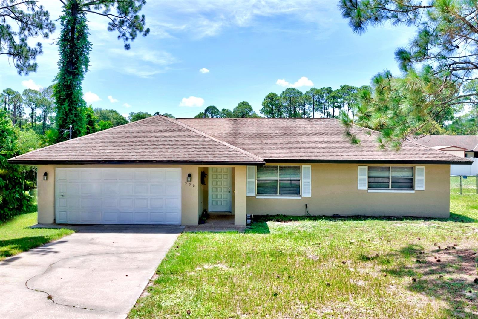 Welcome home to this well-maintained 2-bedroom, 2-bath residence offering comfort, flexibility, and plenty of space to enjoy. In addition to the two bedrooms, the home features a versatile bonus room that can easily serve as a home office, craft room, hobby room, playroom, or utility room. The second full bathroom is conveniently located off this flexible space, making it ideal for a variety of uses. Inside, you'll find a beautifully renovated kitchen with modern finishes, durable vinyl flooring throughout, and a bright, open layout that's perfect for everyday living. Enjoy the best of Florida living with both a fully enclosed Florida room and an expansive screened porch, providing the perfect spaces for entertaining, relaxing, or enjoying the outdoors year-round. Situated on a spacious lot with room to make it your own, this property has been lovingly cared for, including a regularly serviced A/C system for added peace of mind. Whether you're looking for your first home, downsizing, or searching for a seasonal retreat, this home is full of potential and ready for its next owner.