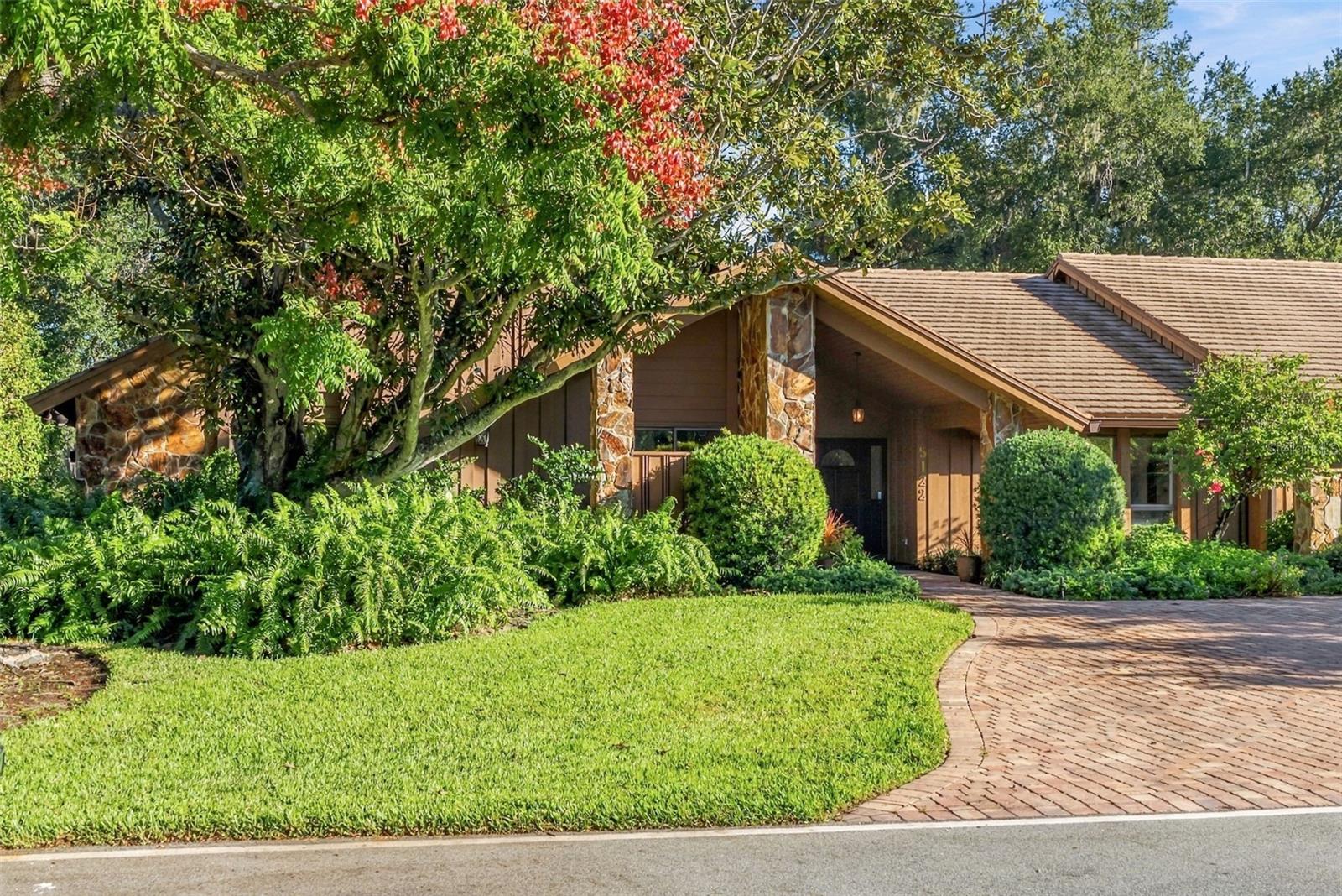 Discover an exceptional opportunity in the Landings, one of Sarasota's most sought-after communities, ideally situated West of the Trail. Custom-built and lovingly maintained by the original owner, this spacious residence offers over 3,700 square feet of gracious living space, featuring four bedrooms and two-and-a-half baths. Thoughtfully designed for both everyday comfort and effortless entertaining, the home presents a wonderful opportunity to personalize and create a space uniquely your own. At the heart of the home, a generously sized kitchen with abundant storage opens seamlessly to an inviting family room, complete with a wood-burning fireplace. The expansive primary suite offers a private retreat, featuring two walk-in closets, walk-in shower, jacuzzi tub, and personal sauna. Outside, a circular driveway welcomes you home, complemented by a discreet side-entry garage. A screened porch provides the perfect setting for al fresco dining or quiet relaxation, overlooking the natural beauty and privacy of the preserve. With ample room to add a pool, the outdoor space offers endless possibilities for creating your own oasis. A rare opportunity to make your mark on a beautifully maintained, custom-built home in an established Sarasota community, where privacy, convenience, and timeless potential all come together.