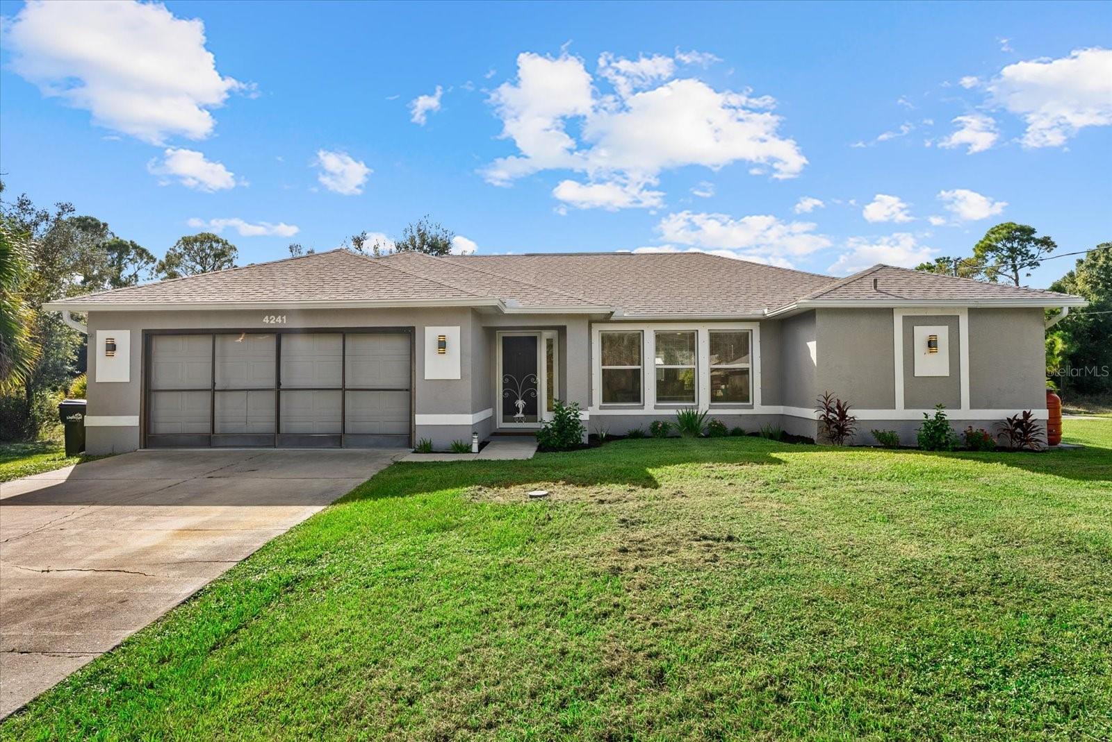 DOUBLE LOT | HEATED POOL & SPA | NEWER ROOF (2023) | FRESHLY PAINTED INTERIOR!

Welcome to 4241 Chamrade Road, where space, comfort, and the Florida lifestyle come together! Situated on a rare double lot totaling nearly half an acre on a quiet North Port street, this charming 3-bedroom, 2-bath home offers plenty of room to spread out, entertain, and enjoy the outdoors.

Step inside to discover a freshly painted interior, a bright, open floor plan, and neutral 20-inch tile throughout the main living areas. The spacious kitchen flows seamlessly into the family room, creating an inviting space for everyday living and entertaining.

The real showstopper awaits outside! Step onto your spacious screened lanai and discover your very own private backyard retreat, complete with a HEATED POOL and SPA! Whether you're enjoying your morning coffee, hosting weekend gatherings, or relaxing in the spa after a long day, this outdoor space is designed for year-round Florida living.

The oversized double lot provides exceptional flexibility, with plenty of room for gardening, outdoor activities, or storing your boat and other recreational toys. A detached 10' x 16' storage SHED offers additional space for tools, hobbies, or a workshop, while sliding garage door screens add versatility and comfort.

Even better, many of the big-ticket improvements have already been taken care of! Updates include a NEW ROOF (2023), kitchen appliances (2023), water heater (2021), pool pump (2021), well pump (2022), and water treatment system (2022). The pool heater was replaced in 2018, and the A/C system has a warranty through 2027. An inside laundry room with an additional pantry closet provides even more convenient storage.

Conveniently located in North Port, with access to shopping, dining, parks, and the beautiful Gulf Coast beaches, this home offers the perfect combination of indoor comfort, outdoor enjoyment, and room to make it your own.

A heated pool, relaxing spa, double lot, and major updates—all in one fantastic property! Don't miss your opportunity to make this Florida retreat your own!