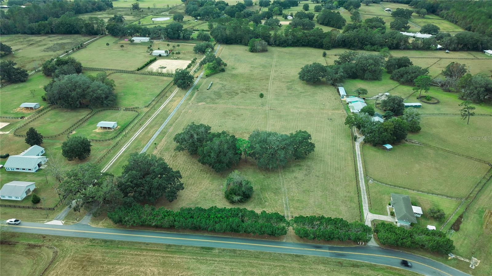 WOW WOW WOW talk about location and investment 14.33 acres are available between HITS/WEC/JOCKEY CLUB! Minutes from I75.  Recently cleared of old fencing/posts/wire and debris cleared and removed.  Beautiful Oak Canopies have been limbed up making it the picture perfect canvas for any design, home, barn, arena you name it!   Right off  of US 27/Blichton  Rd and 95th Avenue Rd you can’t go wrong! If the ground could only talk!  Historical property that was once part  of Harbor View Farm the home of Triple Crown Winner “AFFIRMED!”   Five minute drive to the South and West entrances to WEC.  Nearly all of 95th also known as Miller Rd and 100th Avenue is owned by the World Equestrian Center/Roberts/Golden Ocala Investments.  Little is left that can compare with this piece of land and it falls outside of the HFF restrictions.  One Home/Acre possible with P&Z Applications.  Schedule your showing and own a piece of the history in the Horse Capital of the World!  Call Lena B for your showing today.