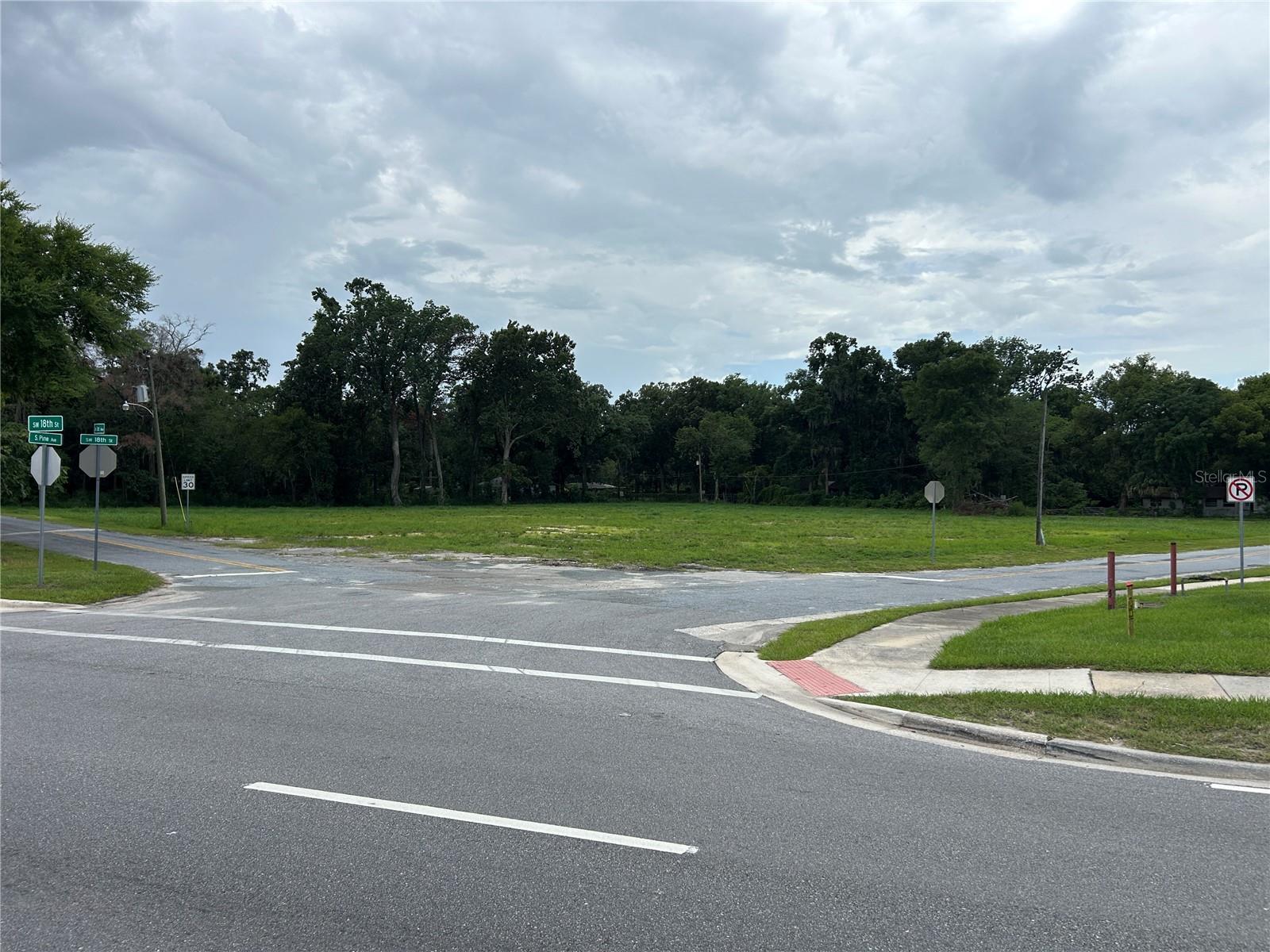 New Lower Price.  Rare opportunity for ownership of a versatile B4 Zoned vacant land parcel at 300 Southwest 18th Street in Ocala. This cleared site was formerly a motel ready for redevelopment. . Utilities are readily accessible, simplifying entitlements and construction.  Ideal for long-term hold strategies or tailored development plans, the tract invites creative visionaries to maximize its potential within a supportive community framework.  B-4 is Ocala's most flexible commercial zoning designation. It is intended for larger retail businesses, highway-oriented businesses, automobile-related uses, restaurants, offices, hotels, and service businesses that generate significant customer traffic or truck deliveries.

Premier redevelopment land with high visibility to Hwy 441/SR301
2.15 Acres, B4 Zoning in 3 parcels
Parcels: 30815-000-00 (1.67Ac), 30821-000-00 (.24Ac), 30818-000-00 (.24Ac)
A redevelopment site with nearby utilities for efficient connection
Direct access to major collector road enhances convenience
Level and cleared vacant land.