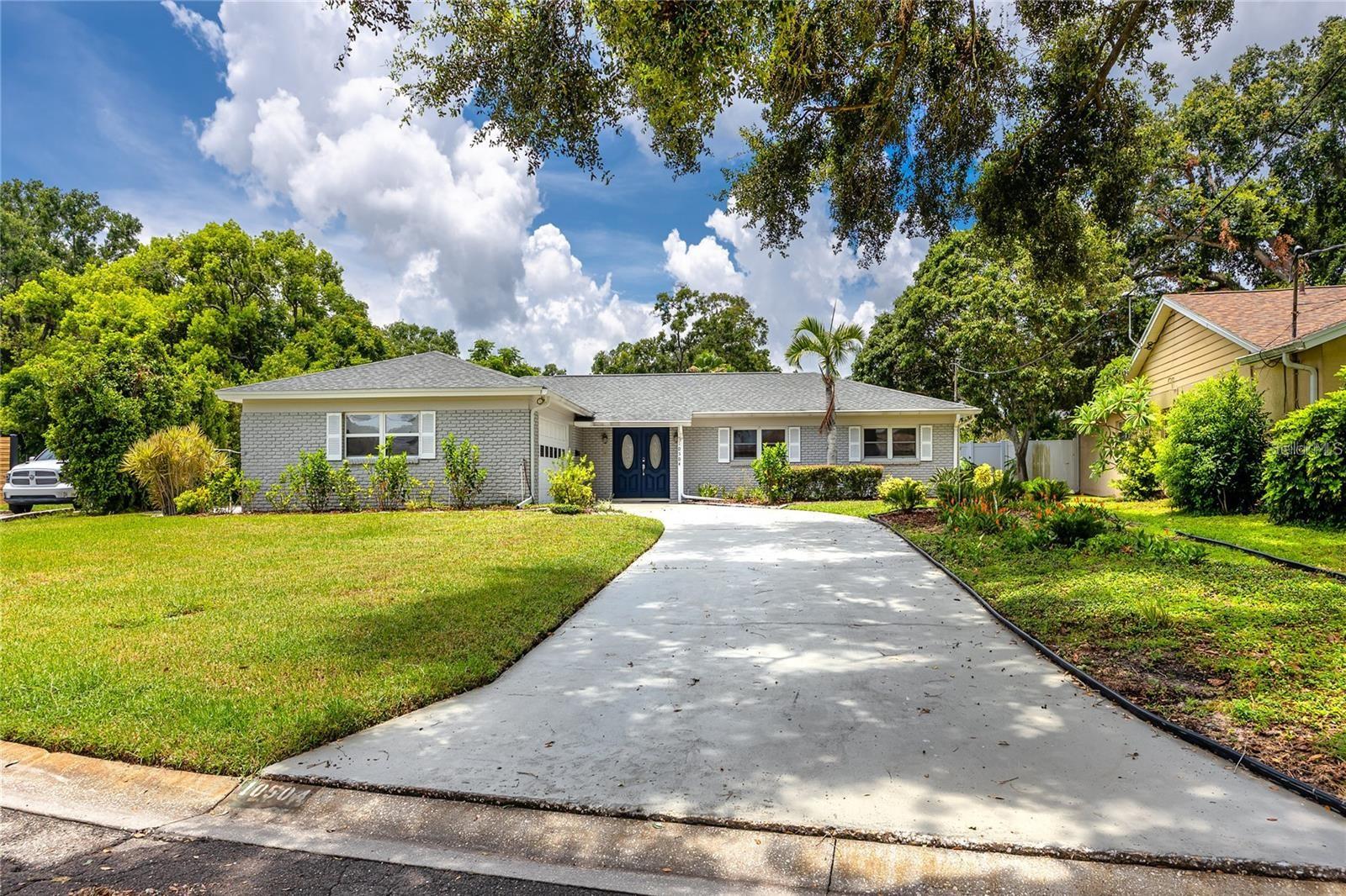 This charming one story pool home has three bedrooms and two bathrooms.  There is a Community Boat Ramp with Access to LAKE CARROLL for LACERA RESIDENT ONLY. The Kitchen has a Center Island with a Breakfast bar, pendent lighting with Stainless Steel appliances and plenty of countertop space. The kitchen opens into the Dining and Living rooms all with tile floors. The Living room is spacious and has sliding glass doors that open to the screened lanai and overlooks the beautiful inground pool and backyard. The Primary bedroom has plenty of room to fit a King sized bed, sliding glass doors leading to the backyard. The secondary bedrooms are nice sized, one large enough for a King sized bed.  The laundry room is oversized and has extra storage space.  There is a 2 car side load garage with a side door entrance. All the windows and sliders were upgraded to thermal/double pane.  There are optional HOA fees which covers the boat ramp. The home is located on a cul de sac and is minutes from shopping, dining, medical facilities, highways, and local parks. This exceptional home is move in ready!