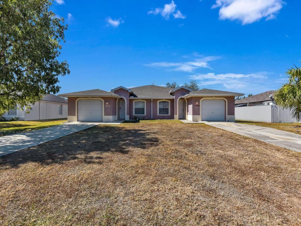 Duplex building in a highly sought-after Southeast Cape Coral location, offering flexibility for investors or owner-occupants. Multi-family opportunities in this pocket are limited, making this a great opportunity to secure a property in one of Southwest Florida’s active rental areas. Each unit offers a comfortable, practical layout with spacious living areas, well-equipped kitchens, private bedrooms, and full baths. Ideally located near shopping, dining, schools, and major roadways, the property benefits from a convenient and desirable setting. Whether expanding an investment portfolio or exploring multi-generational living, this duplex offers plenty of possibilities. Schedule your private tour today.