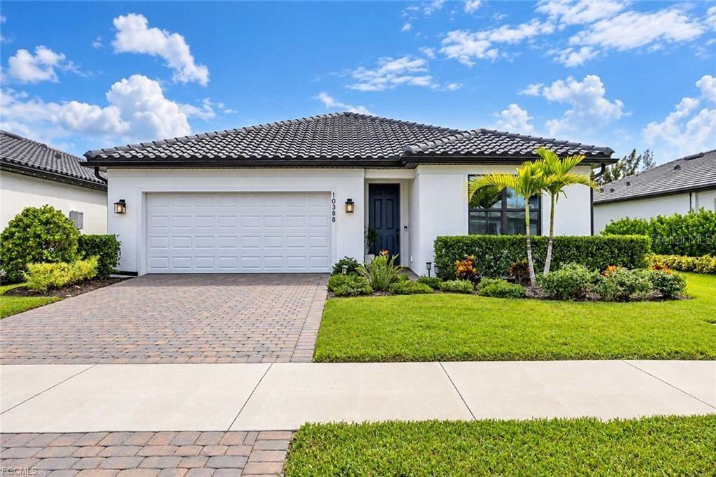 Discover this beautiful, fully furnished, newly constructed (2025) home nestled in the desirable Bonita Del Sol community. This stunning single-story residence offers 3 spacious bedrooms, 2 bathrooms, and 1,663 sq. ft. of thoughtfully designed living space, combining modern comfort with effortless Florida living. The home features durable tile flooring, impact-resistant windows, spacious walk-in closets, and an inviting dining/living area complemented by an eat-in kitchen. Enjoy the convenience of central heating and cooling, a dedicated laundry room with washer and dryer, and an attached 2-car garage. Step outside to the screened porch, perfect for relaxing and enjoying the peaceful surroundings. Situated on a 7,501 sq. ft. lot, this concrete block home features a flat tile roof and a desirable lake view. Residents of Bonita Del Sol enjoy access to a community pool, street lighting, underground utilities, and professionally maintained landscaping. Conveniently located in Bonita Springs, this move-in-ready home offers an excellent opportunity to enjoy the Southwest Florida lifestyle. Schedule your private showing today!