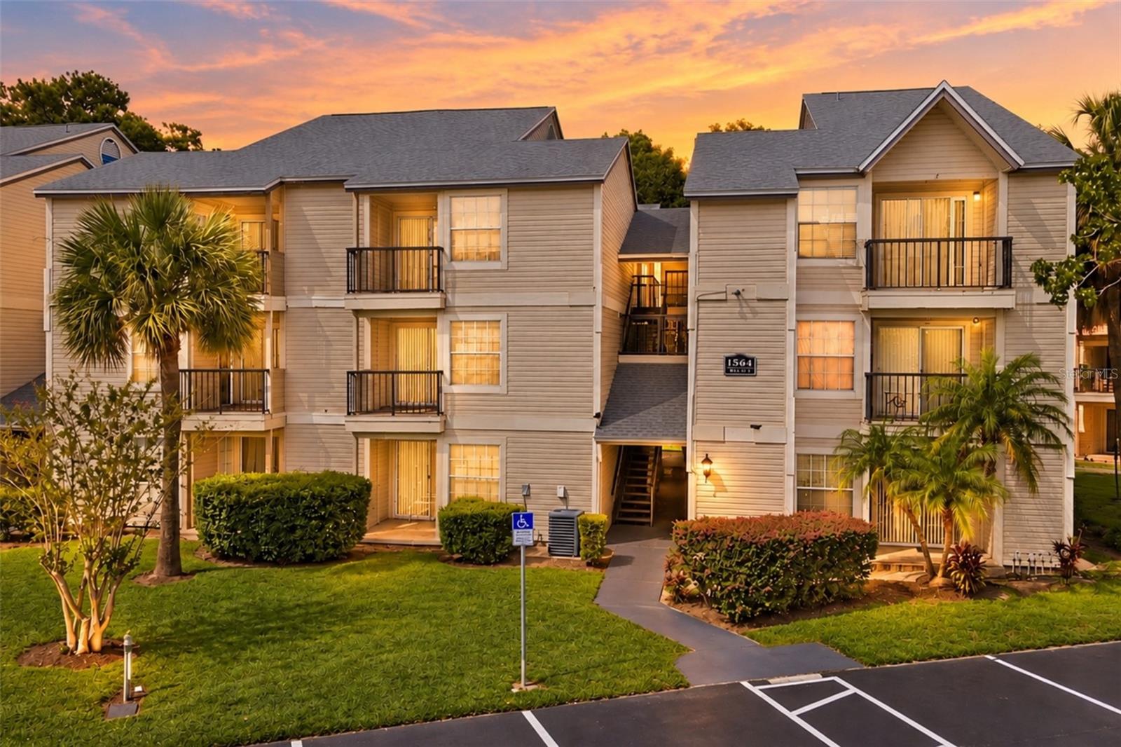 Virtually Staged. Excellent investment opportunity or perfect starter home in the heart of Orlando! Welcome to this low-maintenance, 1-bedroom, 1-bathroom condominium located inside the highly desirable, gated community of the Plaza at Millenium. Spanning an efficient, sunlit floor plan, this unit offers comfortable open-concept living with an eat-in kitchen area ideal for hosting. The primary suite features a sizable layout with ample closet storage. Step outside to relax on your private, covered rear porch space which includes a built-in exterior storage closet. Living here you gain immediate access to premium community amenities managed by The Plaza Condominium Association, including a resort-style swimming pool, a fully equipped fitness center, a clubhouse, a spa/hot tub, and tennis courts. The affordable HOA fee conveniently covers major utility and maintenance costs—including water, sewer, trash removal, pest control, common area insurance, and ground maintenance. Unbeatable location for commuters and lifestyle enthusiasts! You are located less than 5 minutes from elite shopping and dining at The Mall at Millenia. Enjoy effortless transit across Central Florida with immediate proximity to I-4, Florida’s Turnpike, and Downtown Orlando. Universal Studios, Valencia College, and major employer hubs are just a short drive away. Schedule your private showing today before this turn-key opportunity is gone!