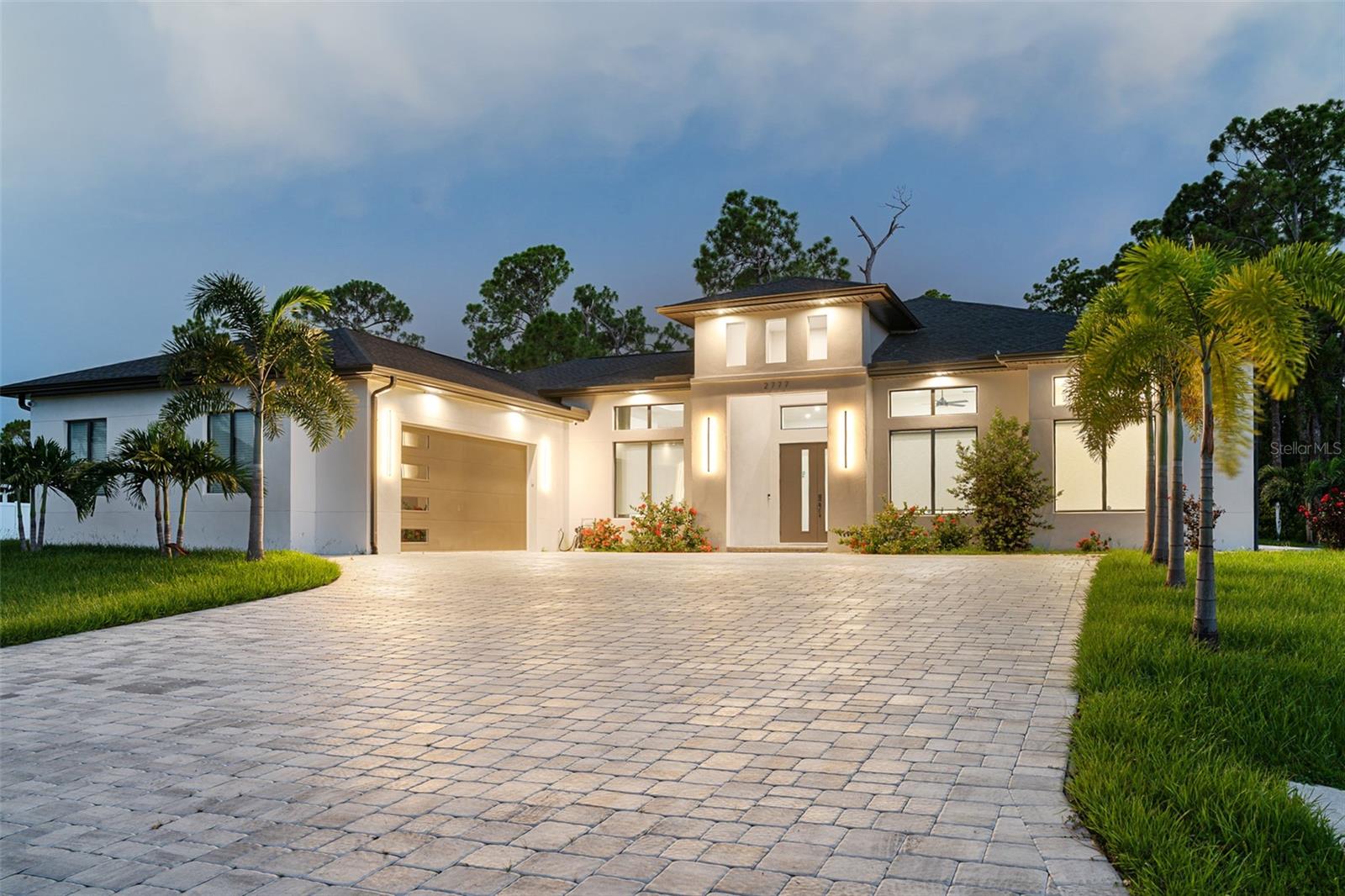 Experience exceptional Florida living in this LUXURY CUSTOM-BUILD HOME, built in 2024, offering 2,679 sq. ft. of living space with 3 bedrooms + OFFICE, 3.5 bathrooms, and an OVERSIZED 2-car garage. Situated on DOUBLE LOTS, this impressive residence combines contemporary design,  spacious living areas, and premium finishes.
From the moment you enter, the dramatic 12-foot ceilings, high interior doors, and expansive hurricane-impact windows and doors create an incredible sense of space while filling the home with natural light. Large sliding glass doors provide a seamless connection to the outdoor living area and enhance the home's open, modern design.
The stunning open-concept floor plan is ideal for both entertaining and everyday living. The gourmet kitchen features an expansive countertop and island area, high-quality cabinetry, stylish range hood, and generous storage. A thoughtfully designed pantry with solid shelving adds functionality and a custom finished look.
The spacious primary suite offers a private retreat complemented by a custom-built walk-in closet. Additional custom closet systems provide excellent storage and organization throughout the home. A dedicated private office provides the perfect space for working from home, studying, or creating a flexible bonus room.
Outside, the property continues to impress with an oversized driveway, oversized 2-car garage, and the additional space and privacy provided by the two-lot setting.
Ideally located in fast-growing North Port, Florida, the home is convenient to Warm Mineral Springs, Costco, Wellen Park, shopping, restaurants, medical facilities, and beautiful Gulf Coast beaches.
Best of all — NO HOA, NO CDD, and NO Flood Zone!
This exceptional 2024 custom-built home offers the combination today's buyers are searching for: luxury, space, quality construction, modern design, privacy, and an excellent North Port location.Schedule your private showing and experience this remarkable home in person!!!