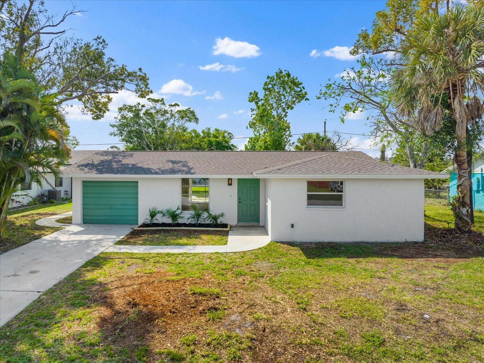 Welcome to this 3-bedroom, 2-bathroom home tucked away at the end of a quiet cul-de-sac in the highly sought-after Rotonda West community. Offering a desirable split-bedroom floor plan and major mechanical updates already completed, this home offers an excellent opportunity for a first-time homebuyer, seasonal resident, investor, or anyone looking to make it their own. The kitchen features solid surface granite countertops, shaker-style cabinetry, a convenient pass-through window overlooking the living area, and a pantry for additional storage. The primary suite offers a walk-in closet and an updated en-suite bathroom with a beautifully tiled walk-in shower. Sliding glass doors lead to a covered back patio, creating the perfect space to relax or entertain while enjoying the peaceful Old Florida setting. One of the biggest advantages of this home is the peace of mind that comes with the major updates already completed, including a 2023 ROOF and 2020 A/C SYSTEM! With some TLC and vision, this home presents an opportunity to add your personal touches and make it your own while enjoying all that Southwest Florida has to offer. Located just minutes from Boca Grande, Englewood Beach, world-class fishing, boating, golf courses, pickleball courts, the Cape Haze Pioneer Trail, shopping, dining, and everything Southwest Florida has to offer, this home provides an opportunity to enjoy the Florida lifestyle at an attractive price point.