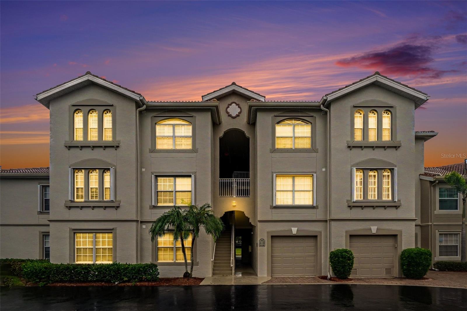 Virtually Staged. Enjoy the best of coastal living just 12 minutes from Fort Myers
Beach and 17 minutes from beautiful Sanibel Island! Ground-floor 3-bedroom, 2-bath first-floor condo means no stairs and you step right out to
your own covered lanai surrounded by lush tropical landscaping. Wood laminate flooring runs throughout with no carpet anywhere. Deep blue
accent walls give the open floor plan a fresh, modern coastal feel. The kitchen features stainless steel appliances, including a side-by-side
refrigerator, over-the-range microwave and electric range. You’ll also find granite countertops, wood cabinetry and a kitchen counter that opens
to the living area. A bright dining space is lit by a woven pendant light. Sliding glass doors fill the living room with natural light and lead out to
the covered patio, a great spot for morning coffee or an evening breeze. The primary suite has a ceiling fan, a walk-in closet with built-in
shelving, and an updated en-suite bath with a tiled walk-in shower, mosaic accents and black fixtures. Both guest bedrooms are a good size and
have their own closets, which makes the home easy to set up for guests, a home office or hobbies. The second full bath has a tub/shower
combo and a stone-finish vanity. An in-unit laundry room with a full-size washer and dryer adds convenience. The well-kept community has
manicured grounds and resort-style amenities, including a sparkling pool, a relaxing spa and a community game room. Investors take note:
monthly rentals are allowed, so this condo works well for seasonal renters who want to be close to the beach. You’re about 12 minutes from the
sand and surf of Fort Myers Beach, with shopping, dining and golf close by. It suits a full-time residence, a winter getaway or an income
property.