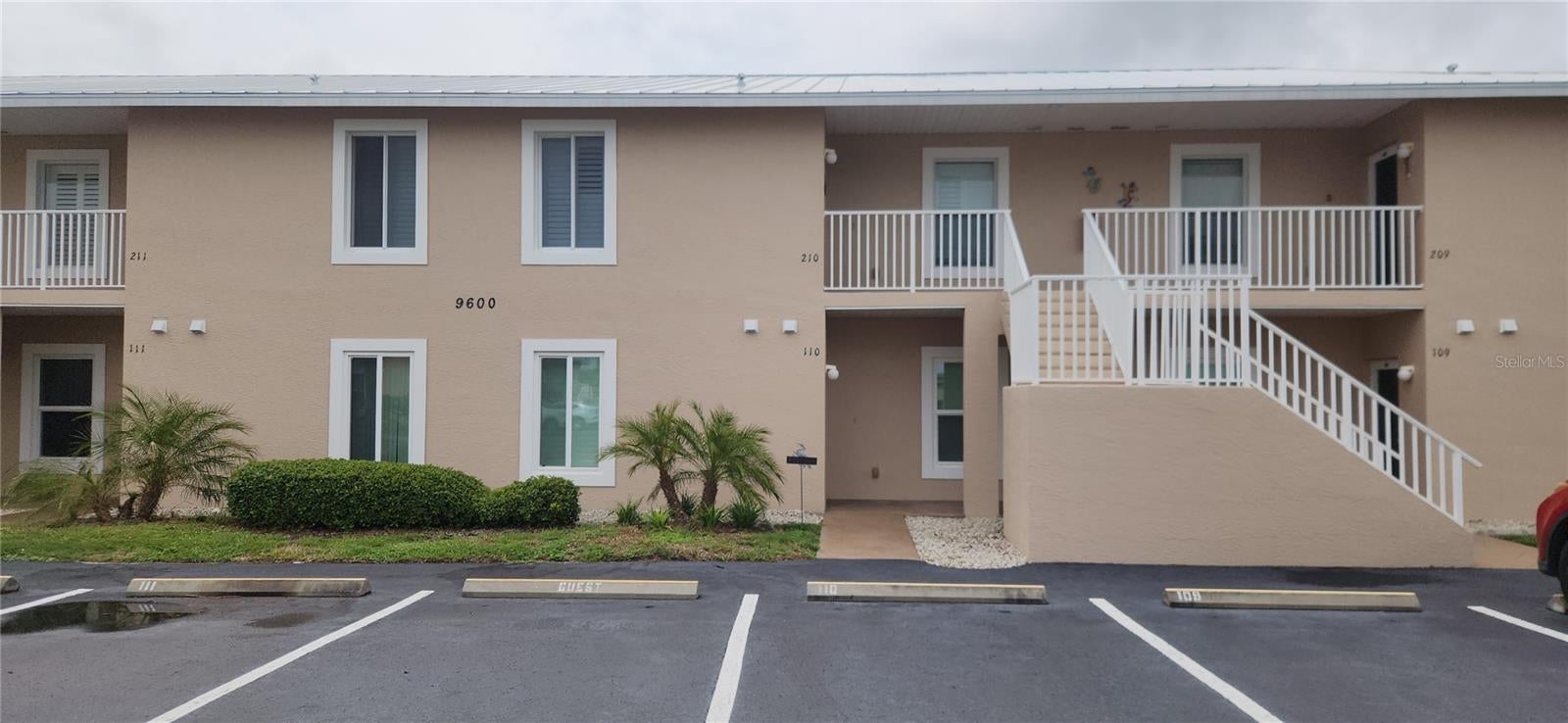 Excellent opportunity to own this completely furnished, turnkey condo in the sought after community of Fiddlers Green Nature Trail!! Leave the worries of packing and unpacking behind as everything you see inside this move in ready condo comes with the home, right down to the silverware and wine glasses. This well kept, first floor unit boasts granite counter tops, a brand new AC unit(July 2026)and new garbage disposal(July 2026) and a large enclosed lania. This slice of paradise is located in close proximity to the areas many golf course, famous Gulf beaches, and world class fishing as well as walking and biking trails. Open the vinal windows on the lania and enjoy the tropical breezes as they blow gently through the screen while you enjoy the wooded view. Steps away from the tennis courts and heated pool, you can relax in the club house with a large kitchen, bar area, as well as pool and ping pong tables or enjoy one of the grilling stations under the shade on the well maintained grounds. Standing seam metal roofs provide a feeling of security during the storms and the outdoor maintenance give you peace of mind so you can relax and enjoy the Florida lifestyle you've been dreaming of. Dont forget your pets as this pet friendly neighborhood allows 2 pets under 30 lbs each. Come make this your own slice of paradise before it gets sold!