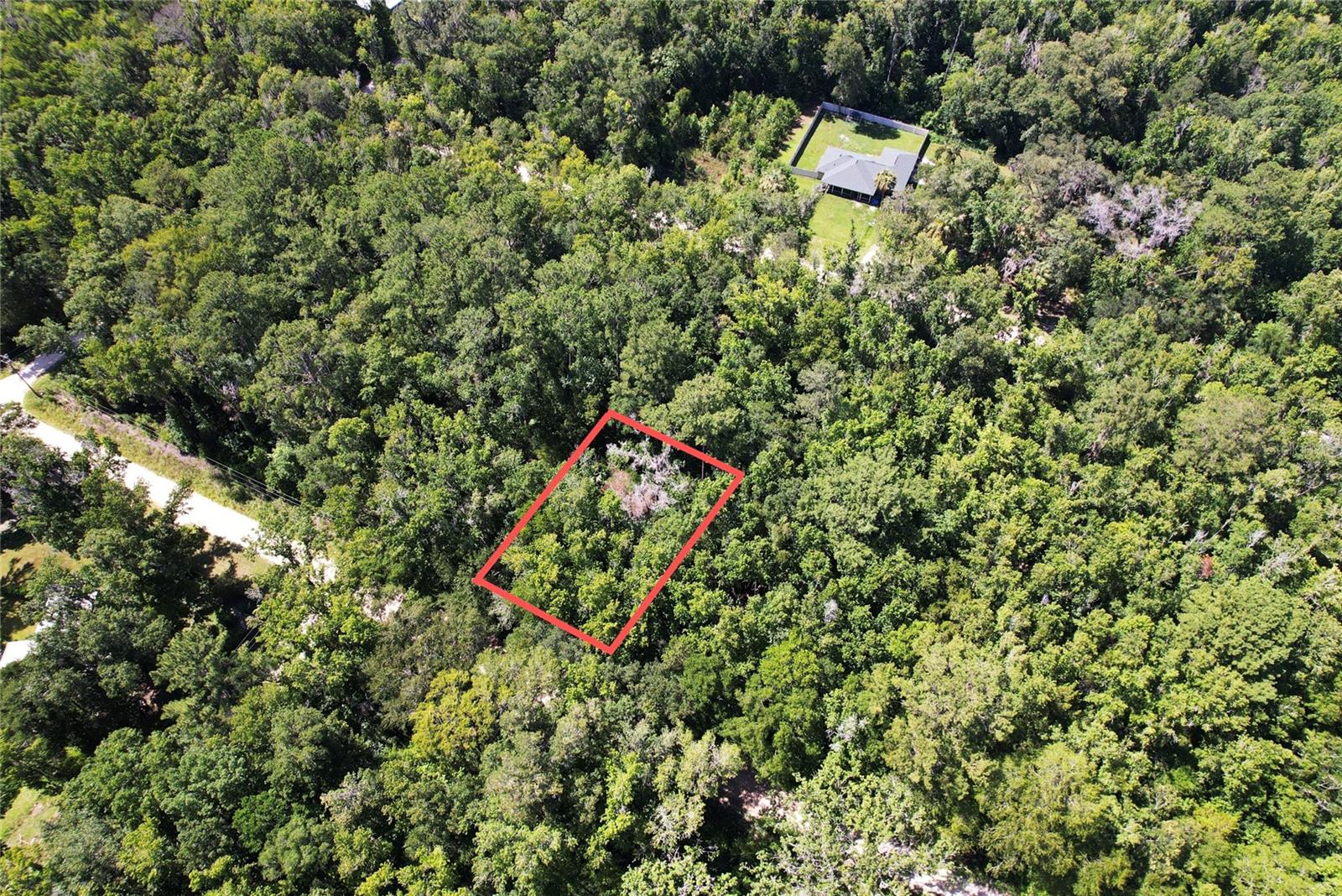 MOBILE HOMES OK! Very close to town in the Rainbow Park neighborhood, this lot is the best value on the market. No HOA. This is Marion County Parcel  2008-020-005.  GPS Coordinates to center of property: 29.175050, -82.344382. Enter coordinates into google or apple maps for directions. Listing address is not an official address and is just for mapping purposes.