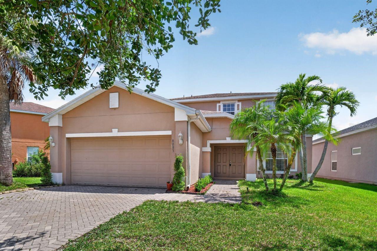 RECENTLY UPDATED ROOF (JULY 2025) & A/C SYSTEMS (AUGUST 2026)!! Perfect family home with beautiful lake views! Offering more than 3,200 square feet of living space, this spacious 5-bedroom, 4-bathroom home with a 2-car garage features formal living and dining rooms, an open-concept kitchen with granite countertops and stainless-steel appliances, a breakfast nook, and a great room that opens to a screened patio. Wood-look plank flooring runs throughout the living areas and bedrooms.

The first floor includes a laundry room, guest bath, and a convenient Jack-and-Jill suite with two bedrooms. Upstairs, an oversized bonus room serves as the centerpiece of a split-bedroom floor plan. One wing offers an additional Jack-and-Jill suite, while the private owner’s retreat features a sitting area, custom walk-in closet, dual vanities, walk-in shower, garden tub, and separate water closet.

Enjoy peaceful lake views from the upstairs screened balcony. Publix, restaurants, banks, UPS, a pet hospital, gas stations, and other everyday services are just a short distance away, with some amenities potentially within a short walk. Conveniently located near I-75, this exceptional home is ready for its next owner. Come see it and fall in love!