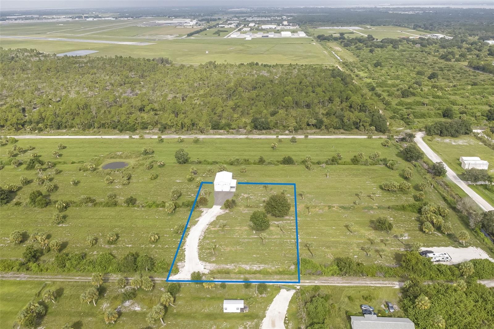 Build your dream barndominium without starting from scratch. This 1.25-acre AG-zoned property (ADDITIONAL PARCELS AVAILABLE!) includes a newly constructed steel building ready to become your custom barndominium, workshop / studio, or ultimate man cave. Features include oversized roll-up doors, soaring ceilings, concrete floors, electric service, covered storage, and an asphalt driveway. Need more or less land? Additional acreage options are available, contact us for full marketing brochure. Conveniently located near Punta Gorda Airport, I-75, and downtown Punta Gorda. Contact us for full marketing brochure and land combination options.