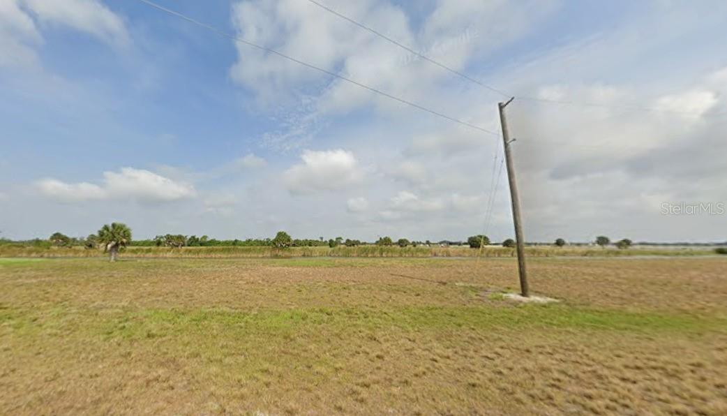 Residential vacant lot located in the deed-restricted community of Rotonda Meadows & Villas in Placida. This homesite offers access to public water and sewer services along with a low HOA, making it an excellent opportunity to build a primary residence, seasonal getaway, or investment property. Conveniently located near Gulf beaches, championship golf courses, marinas, boating and fishing, restaurants, and shopping. Enjoy the peaceful surroundings while remaining close to the many attractions and amenities of Southwest Florida.