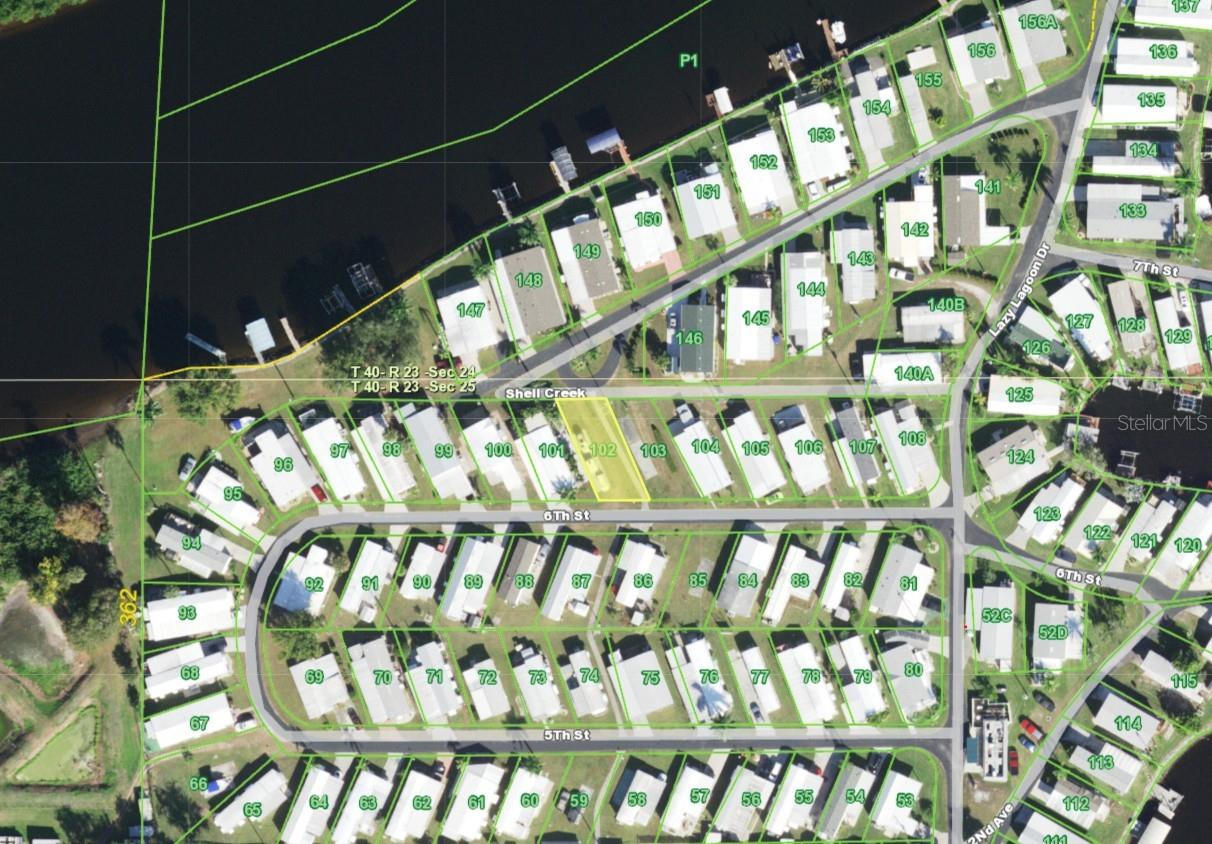 Build Your Waterfront Lifestyle in Lazy Lagoon! Discover the perfect spot for your next adventure with this great vacant lot in the highly desirable 55+ Lazy Lagoon community! Ready for your mobile home or RV parking, this property offers a head start on your plans with electricity, water, and sewer already connected. Save time and setup costs while making the most of this fantastic opportunity to enjoy Florida waterfront living. Enjoy an Amazing Range of Community Amenities! Lazy Lagoon offers a fun, relaxed lifestyle with plenty to enjoy. Take advantage of private roads, extra guest parking, and an exclusive boat ramp with easy access to Shell Creek. Love fishing? The handy fish cleaning station makes it easy to clean your catch. Spend time at the impressive 2,000-square-foot clubhouse, featuring a commercial kitchen for community events and gatherings. Challenge a friend to shuffleboard, enjoy a game of billiards, or relax in the pool room. Boating enthusiasts will love the more than 2,000 feet of maintained community shoreline. Plus, a private, secured storage compound is available for boats and trailers for a small annual fee. Great Location Near Punta Gorda! Enjoy peaceful waterfront surroundings while staying close to the best of Punta Gorda. Explore local restaurants, shopping, waterfront parks, and entertainment just minutes away. With utility connections already in place, fantastic community amenities, and convenient access to Shell Creek, this Lazy Lagoon vacant lot is a wonderful opportunity to create your ideal Florida getaway. Make the most of the waterfront community living in this well-maintained, amenity-rich neighborhood!