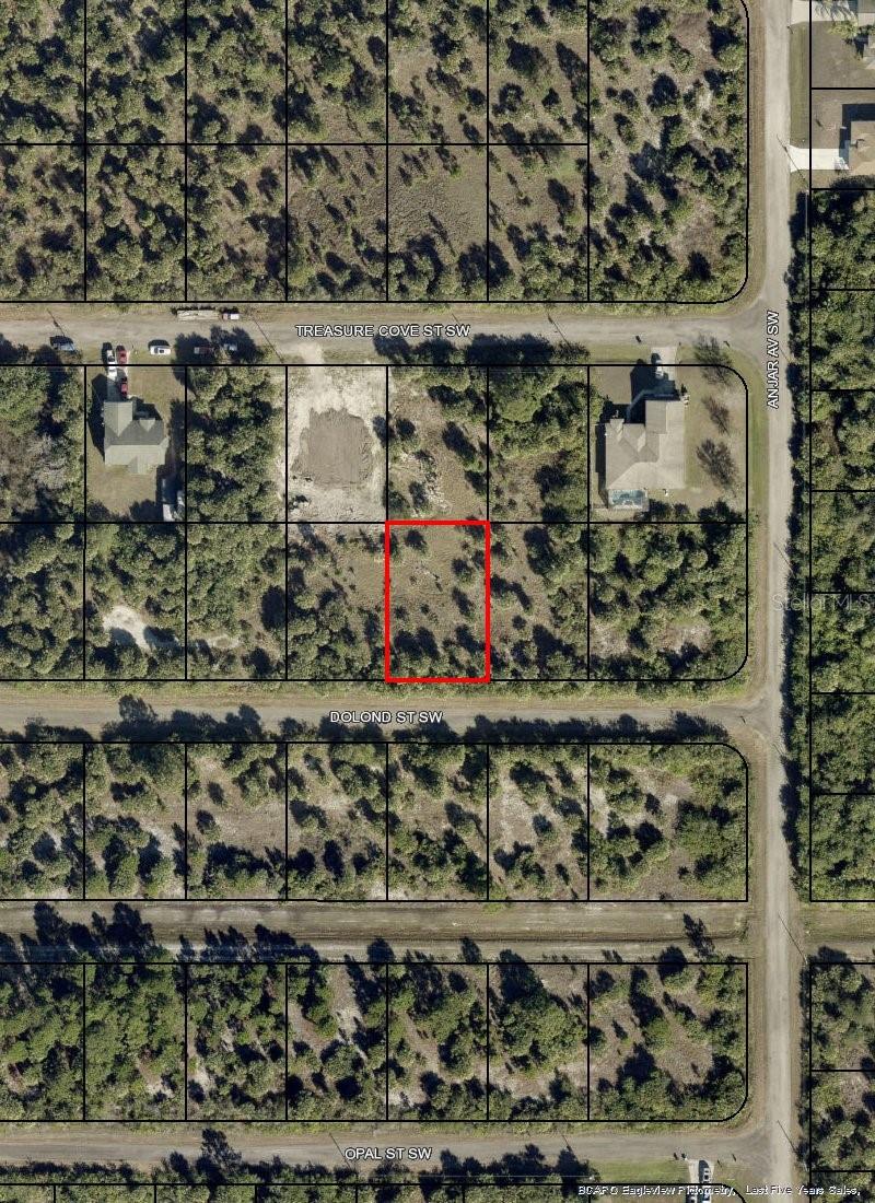 Great opportunity to own a 0.23-acre residential lot in Southwest Palm Bay! This approximately 10,019 sq ft property is located in Port Malabar Unit 49, in an established and developing residential area with homes nearby. Conveniently located approximately 2.6 miles from Westside Elementary School and about 4.6 miles from Publix. A great opportunity for future development or long-term investment. Buyer and buyer’s agent to verify zoning, utilities, buildability, environmental conditions, and all development requirements with the appropriate authorities.