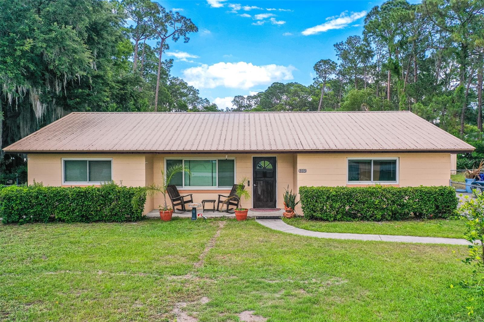 Updated 3BR/2BA Home with Office/Den — Across from Lake Francis Boat Ramp, Lake Placid, FL

Step inside this inviting, move-in-ready home perfectly positioned across from the public boat ramp on Lake Francis, offering prime access to boating and fishing right out your front door. This thoughtfully updated 3-bedroom, 2-bath residence with an additional office/den combines comfort, functionality, and modern style.

Inside, you’ll love the brand new luxury vinyl flooring throughout, creating a fresh, cohesive look that complements the home’s bright and open layout. The spacious living room flows seamlessly into the dining area and updated kitchen, ideal for both relaxing and entertaining.

The remodeled kitchen showcases solid wood cabinetry, butcher block countertops, stainless steel appliances, a center island, pantry, and generous counter space. The split floor plan allows for flexible use, with a dedicated office/den perfect for working from home or accommodating guests.

The primary suite features a modern walk-in shower, while additional updates include a newer front-load washer and dryer for added convenience.

Exterior highlights include a screened-in lanai, newer metal roof, large carport for covered parking, fenced backyard, and mature tropical landscaping—all providing a perfect balance of privacy and outdoor enjoyment.

Located in the heart of Lake Placid, known as the “Town of Murals” and surrounded by dozens of freshwater lakes, you’ll enjoy easy access to local dining, shopping, parks, and year-round recreation. Embrace the Florida lifestyle with water views and small-town charm just steps from your front porch.

Property may qualify for USDA financing—buyers to verify all loan eligibility requirements.